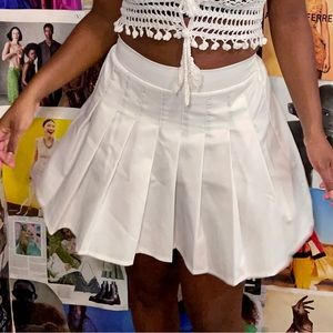 PLEATED MINI SKIRT